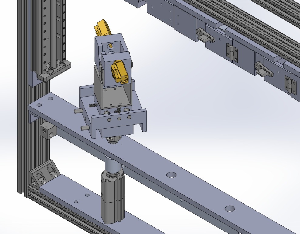 A SolidWorks model of a complex automated mechanical system.